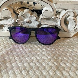 Detour womens sunglasses, with purple polarized lenses.